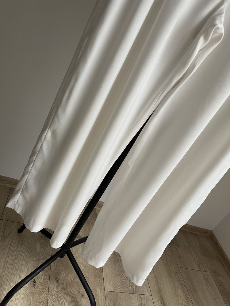 Śmietankowe spodnie z szerokimi nogawkami Atmosphere r.42