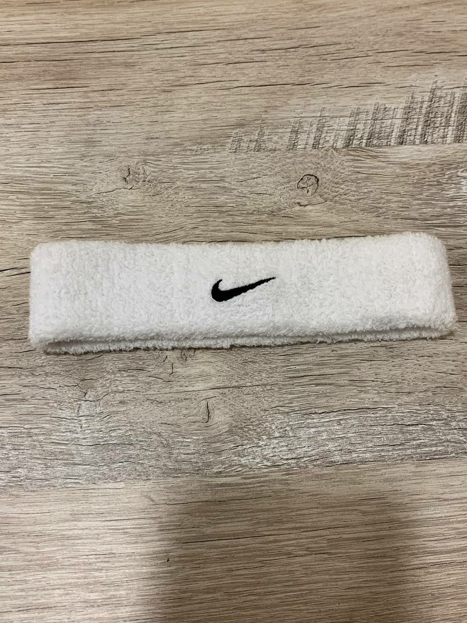 Пов'язка Nike біла