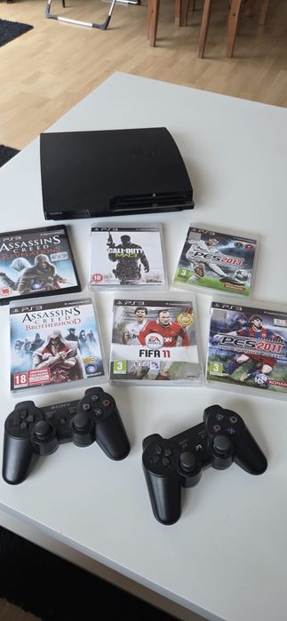PS3 com drive de DVD + cmd Sony DualShock e DualShock univ. + 6 jogos