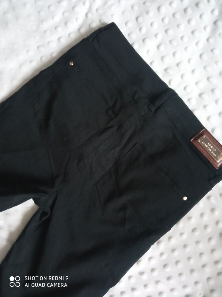 Mohito czarne elastyczne cienkie rurki spodnie złote zamki 32 XXS