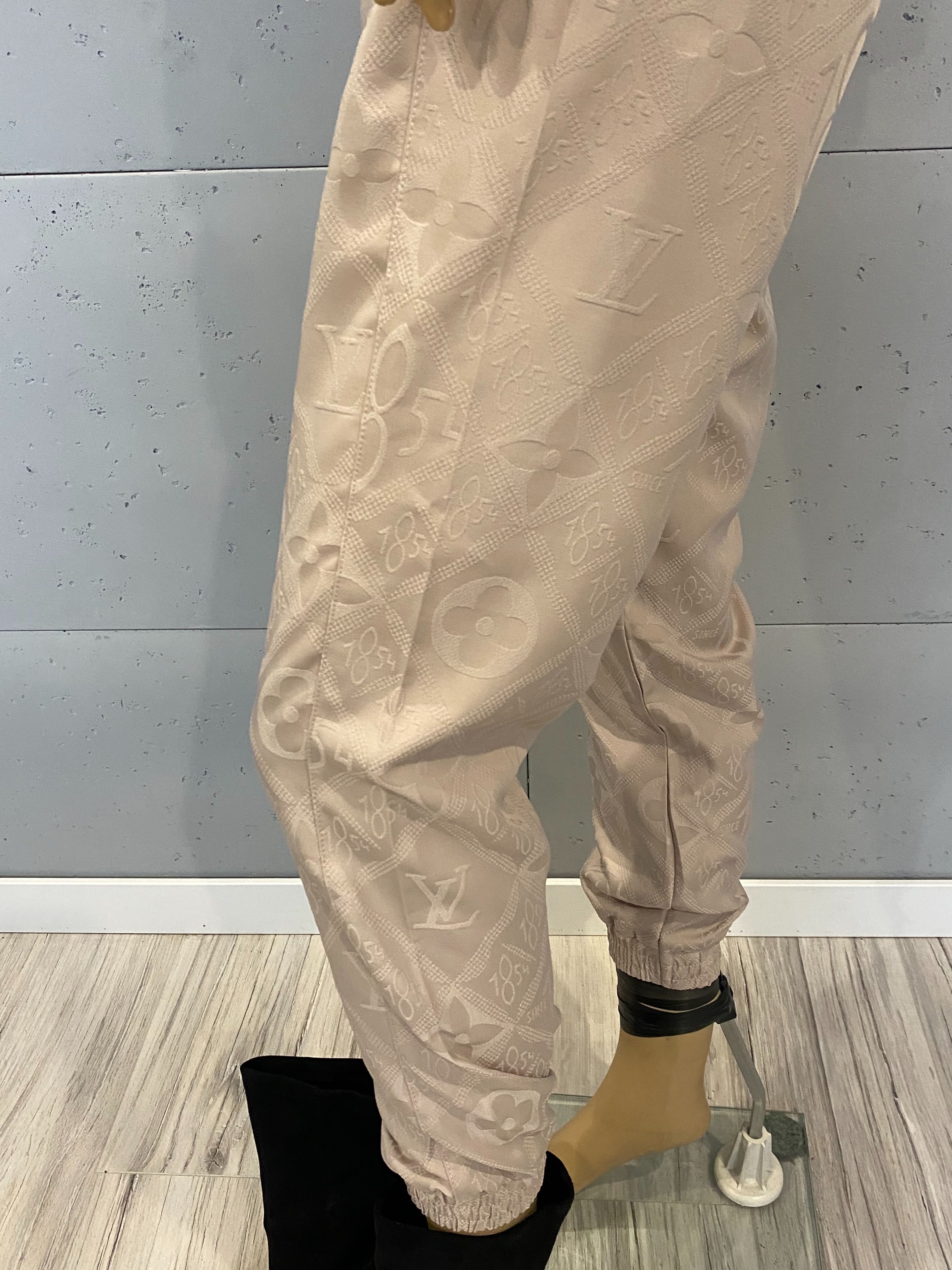 LV beżowo złote  spodnie  z wytlaczanym wzorem SM