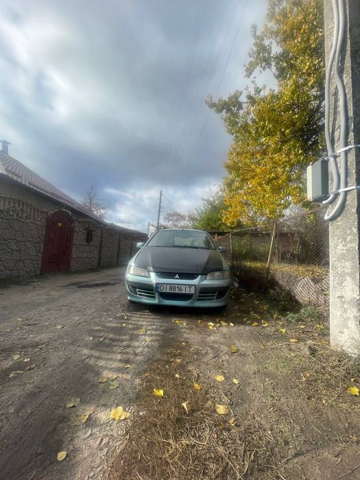 Мицубиси спейс стар