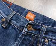 Spodnie ** Jeansy ** Hugo Boss  ** 30/32. ORANGE