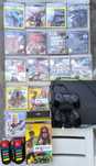 PS3 + 2 comandos + jogos + 2 microfones