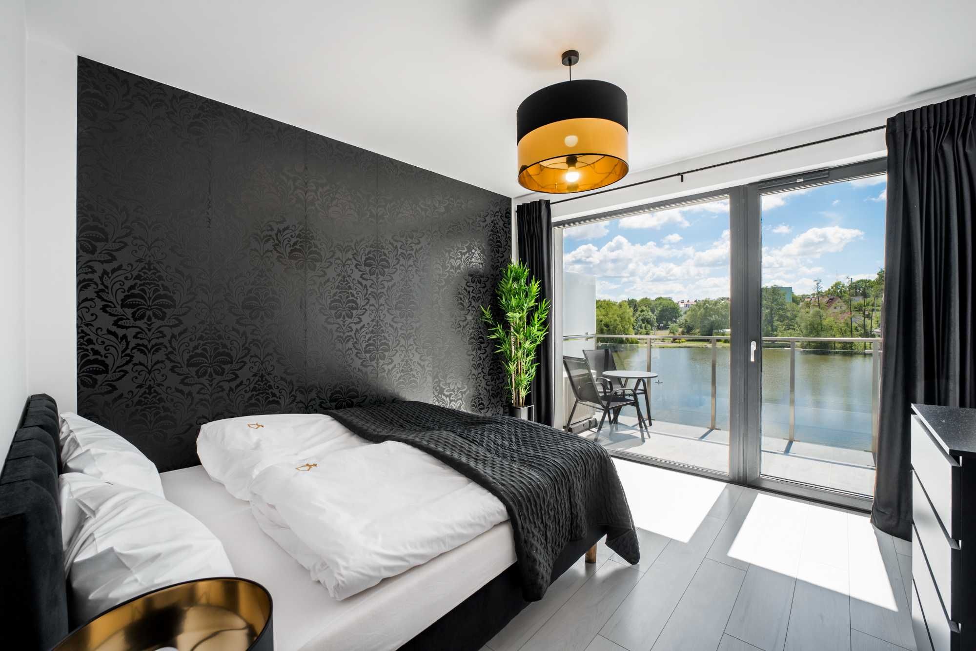 Apartamenty nad jeziorem sauna Mazury, nocleg domek mieszkania na doby