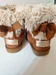 Botas com pêlo conguitos