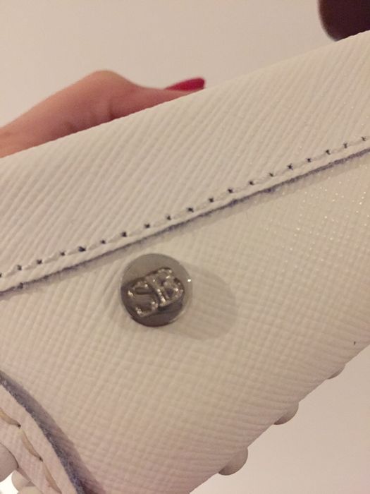 Sapatos brancos da Sacoor