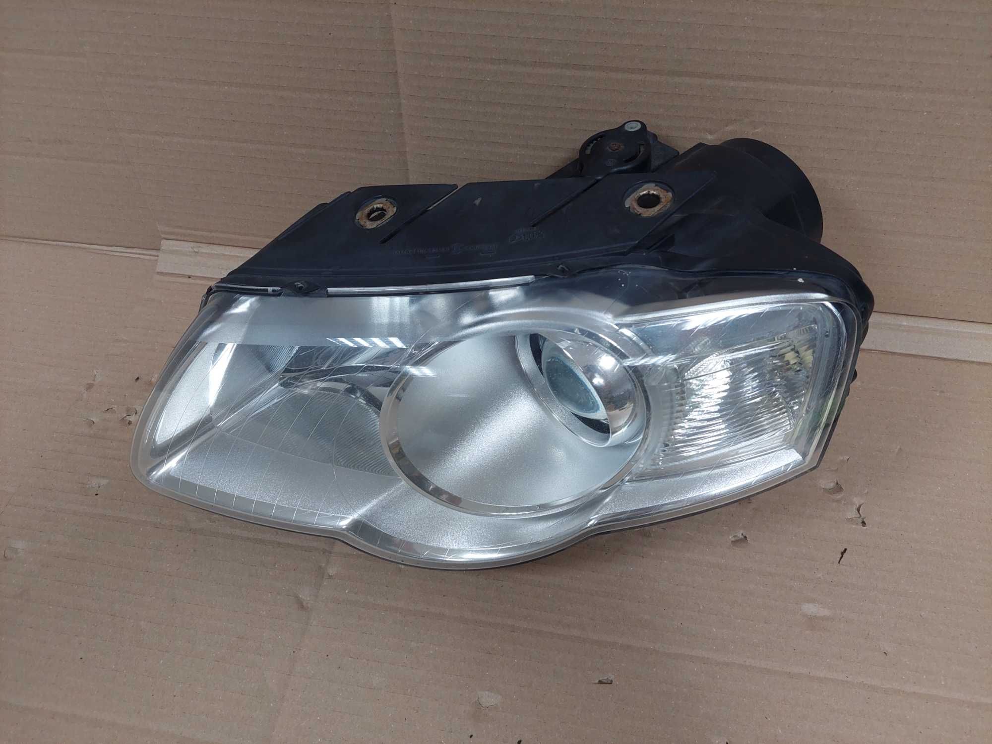 VW Passat B6 05-10r lampa przód lewa zwykła H7 VALEO EU BDB KPL