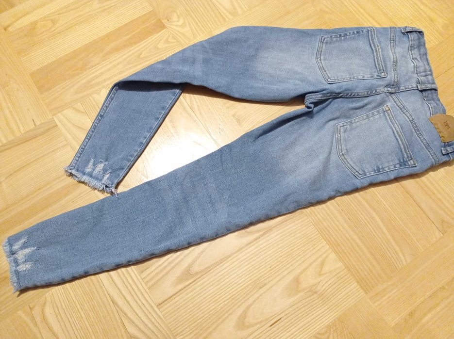 Spodnie z przetarciami dziurami ZARA 152 jeansy