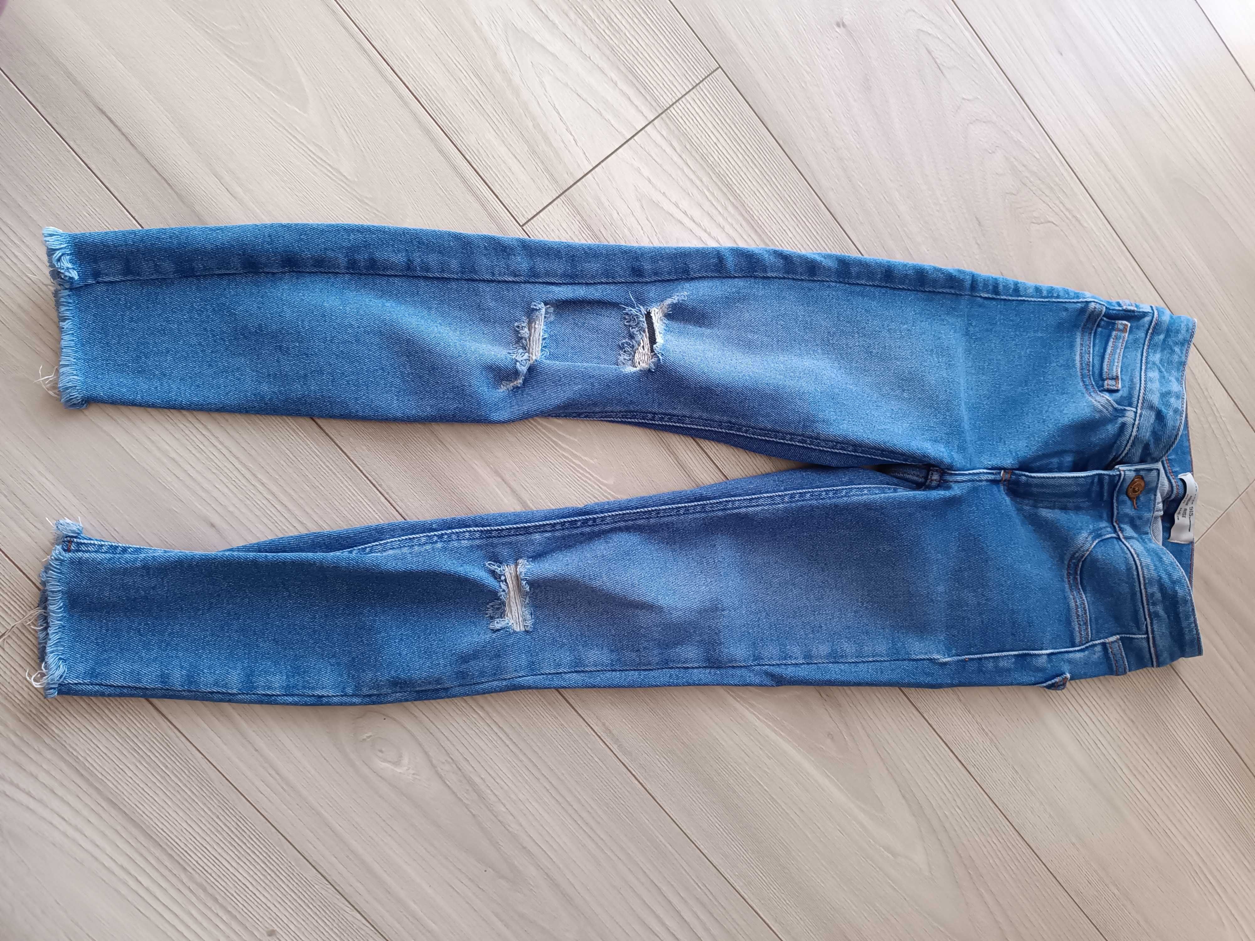 Spodnie dziewczęce jeansowe z dziurami skinny używane, rozmiar 146 cm