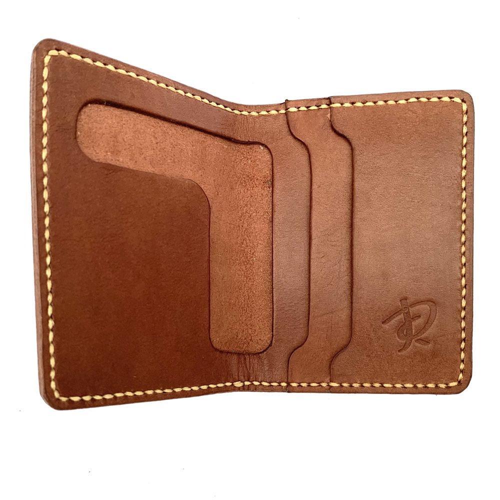 Brązowy portfel uszyty ręcznie ze skóry. Handmade.