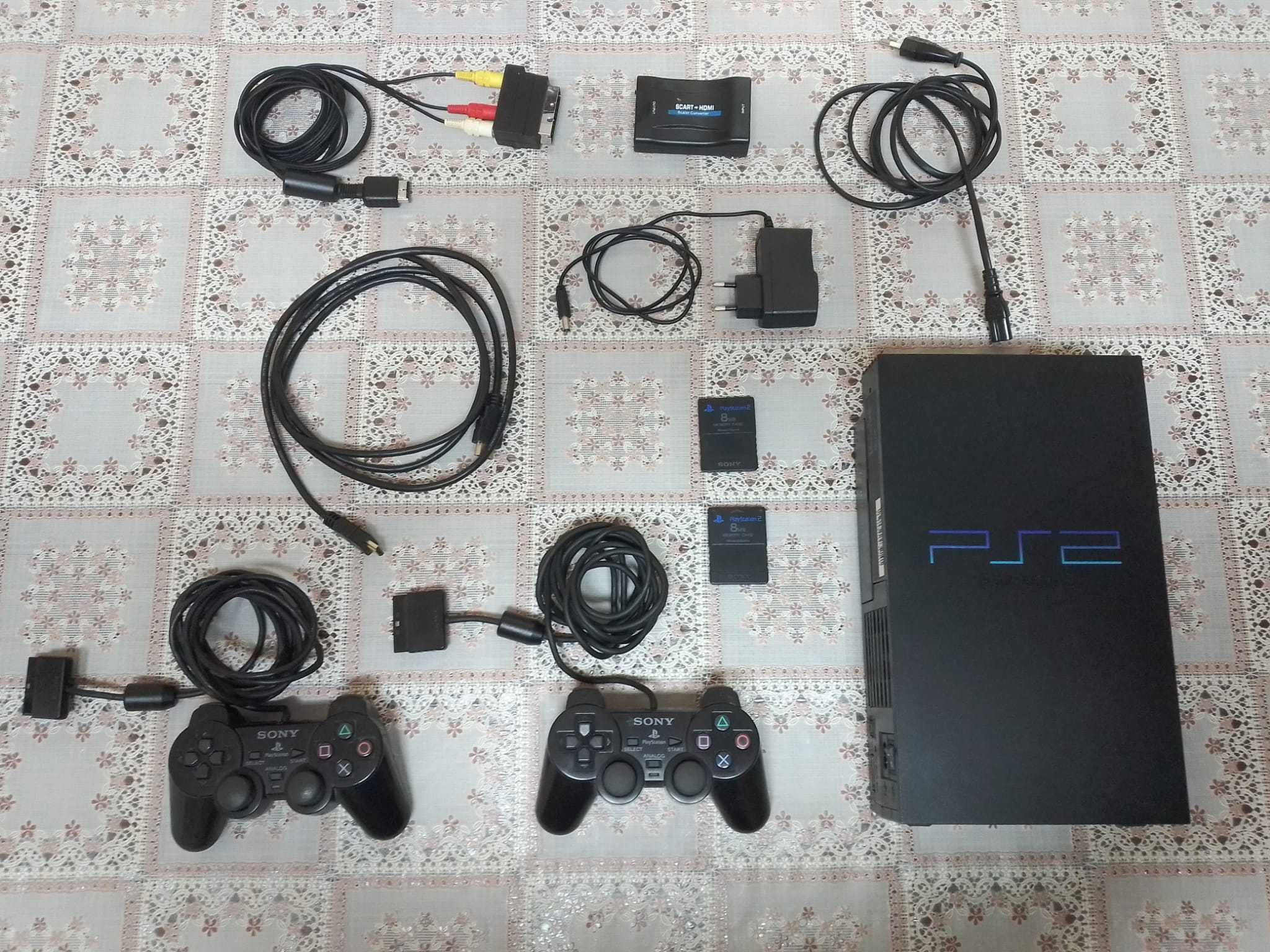 Consola PlayStation2 com 2 comandos, 2 Memory Card e 19 jogos