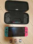 Nintendo Switch Oled + 3 gry + etui + nakładki na joysticki