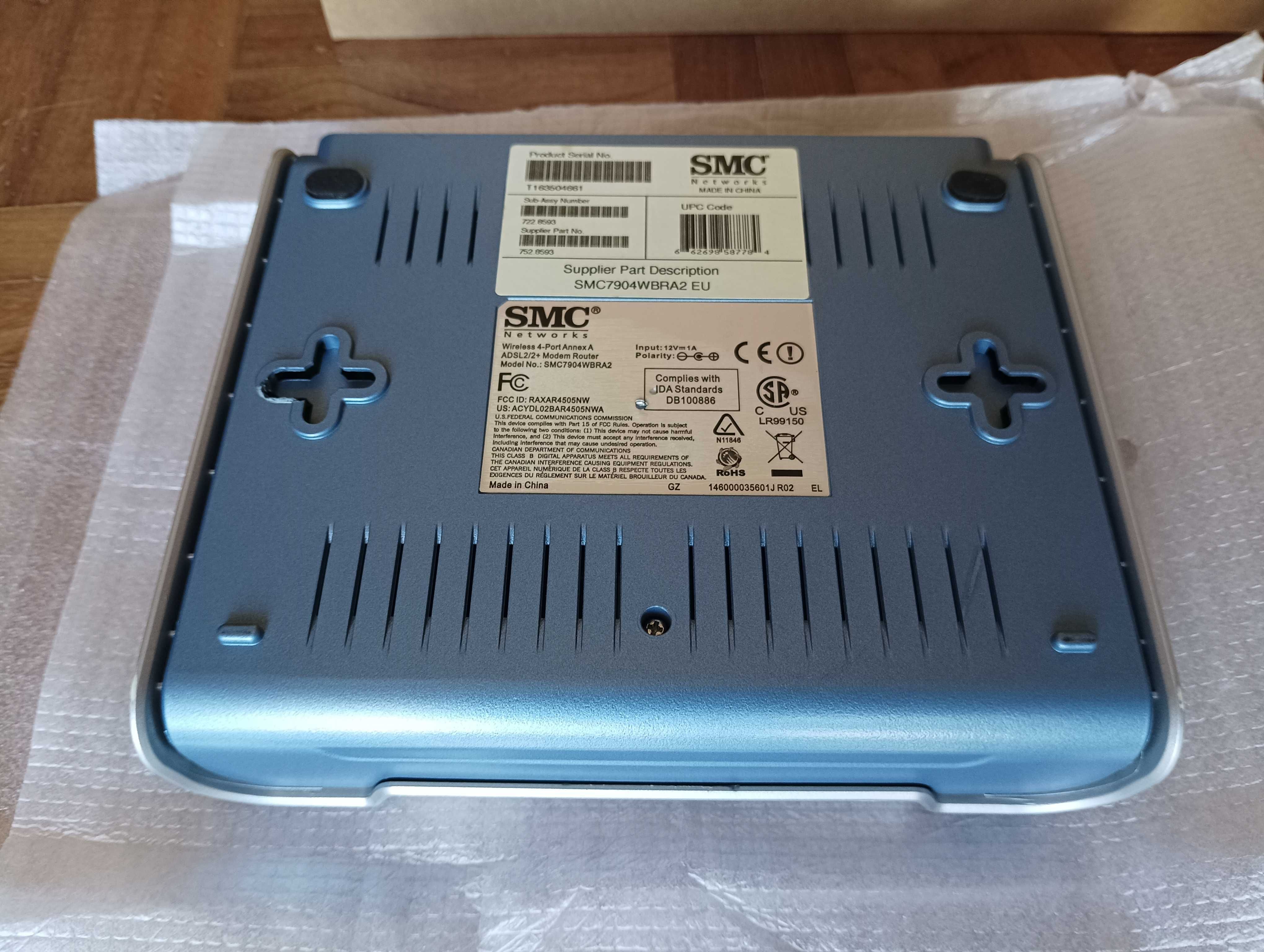 Router Modem ADSL 2+, Marca SMC, e Pen Wireless USB