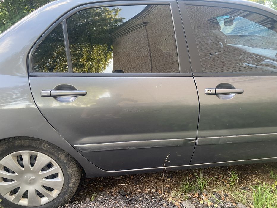 Двері двери міцубісі мицубиси лансер 9 mitsubishi lancer 9