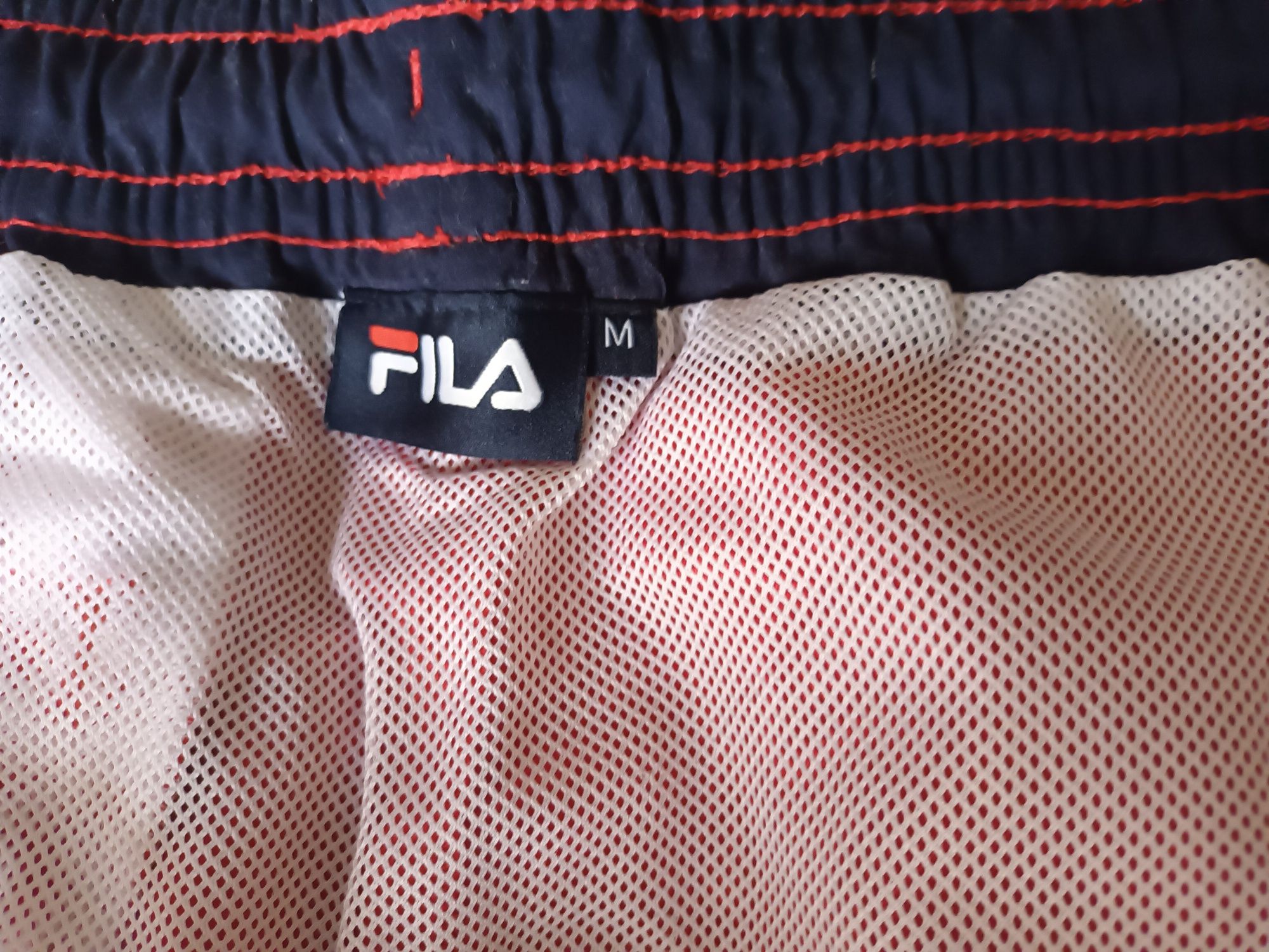 Calções vermelhos - Fila