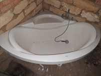 Кутова ванна Devit зі змішувачем Hansgrohe