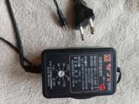 AC-DC adaptor 110-220V.  Выход: 1.5- 14V