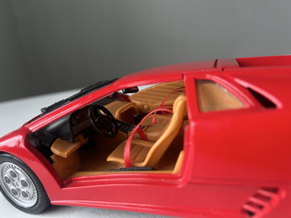 автомодель Lamborghini Diablo 1:18 \Pontiac GTO  Muscle Machines 1966