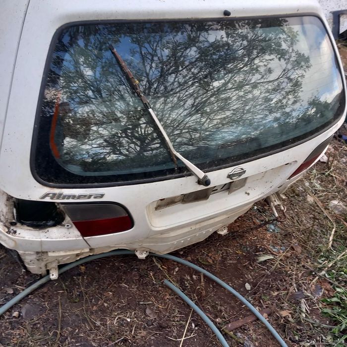 Mala e farolins nissan almera n15