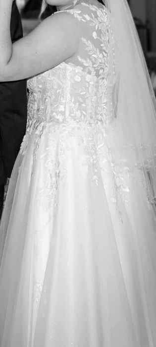 Biała suknia ślubna w stylu boho