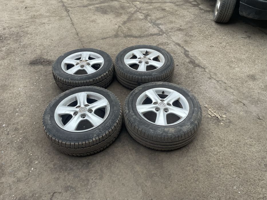 Продам титани r15 5/114.3 з хорошою літньою резиною