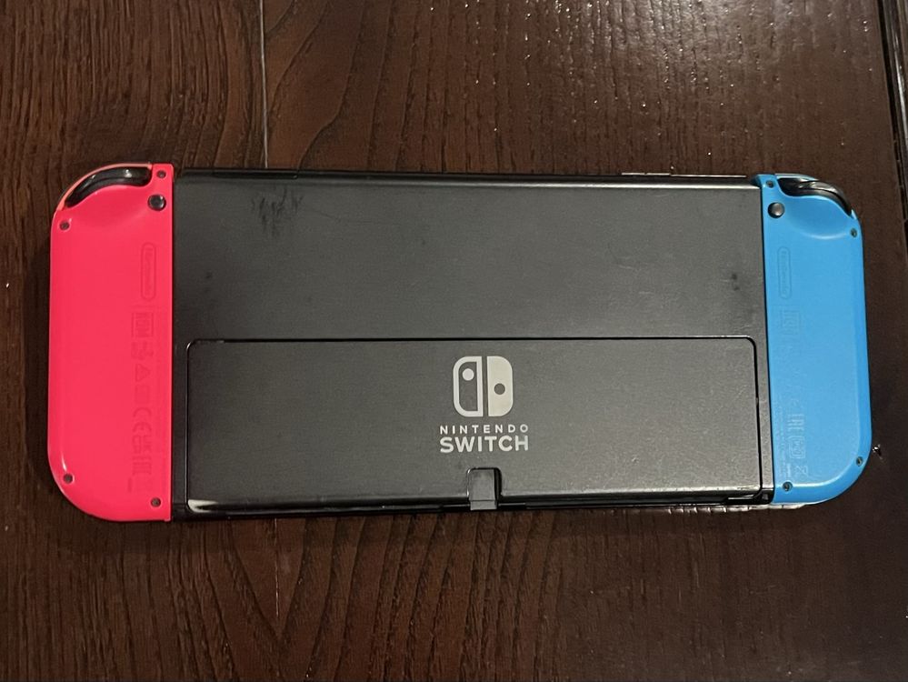 Nintendo Switch OLED + FIFA 23 + vários acessórios
