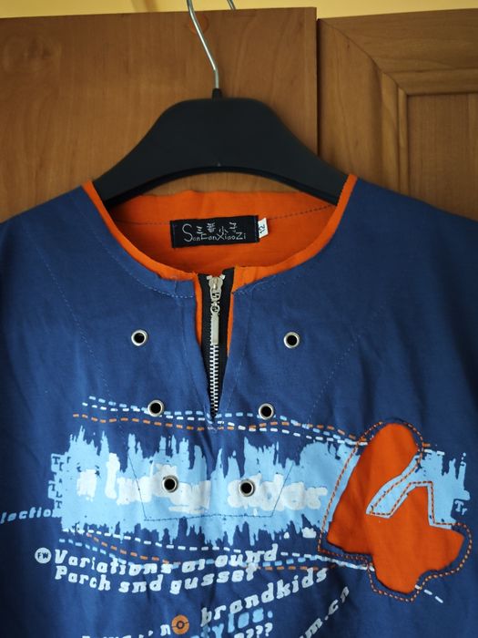 Koszulka t-shirt chłopięcy niebiesko-pomarańczowy rozmiar 146