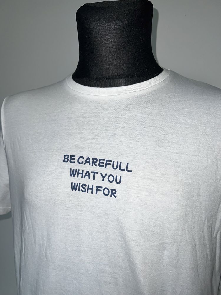 Męska biała koszulka z nadrukiem " be careful what you wish for ”