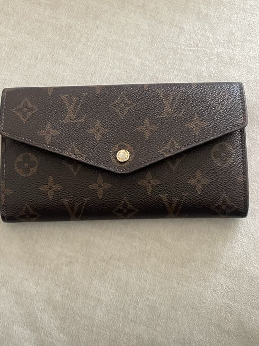 Mala e carteira em bom estado