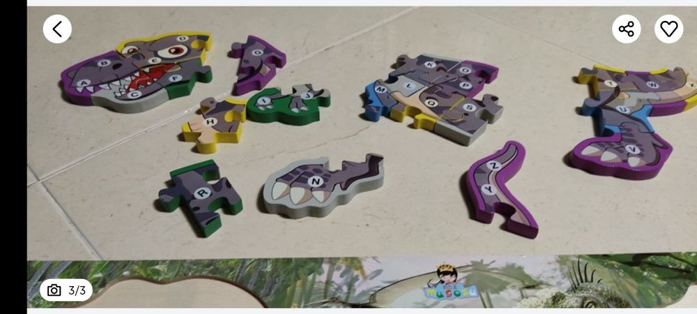 Puzzle dinossauro com as letras do alfabeto