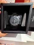 Swatch x Omega Bioceramic Moonswatch Mission To Moonphase Snoopy
Black