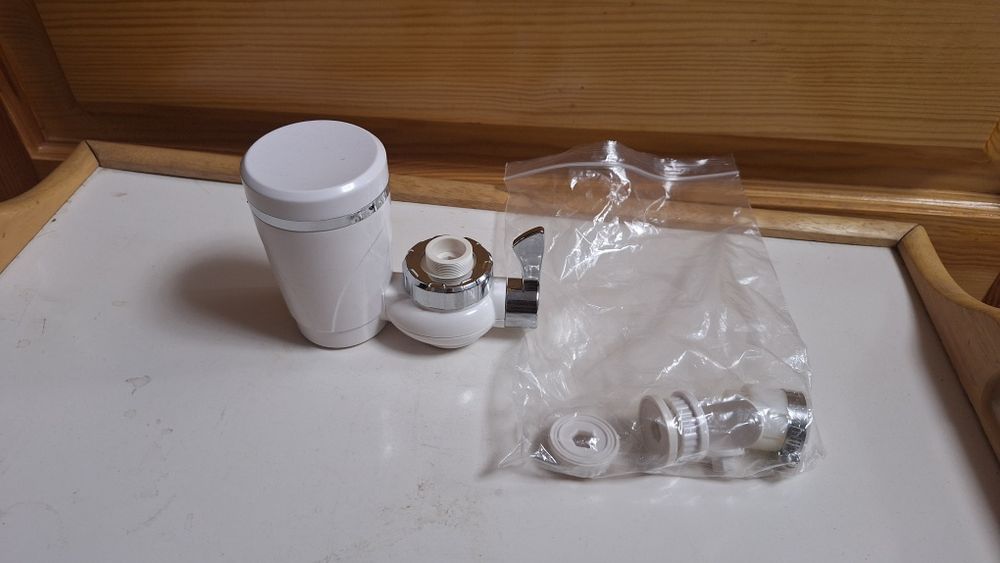 Насадка фільтру на кран