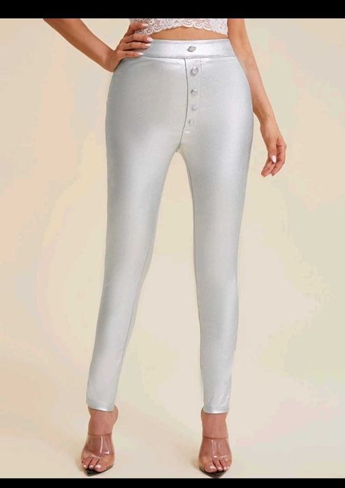 Nowe spodnie błyszczące legginsy