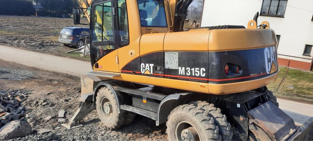 Koparka kołowa obrotowa CAT M315 C rototilt