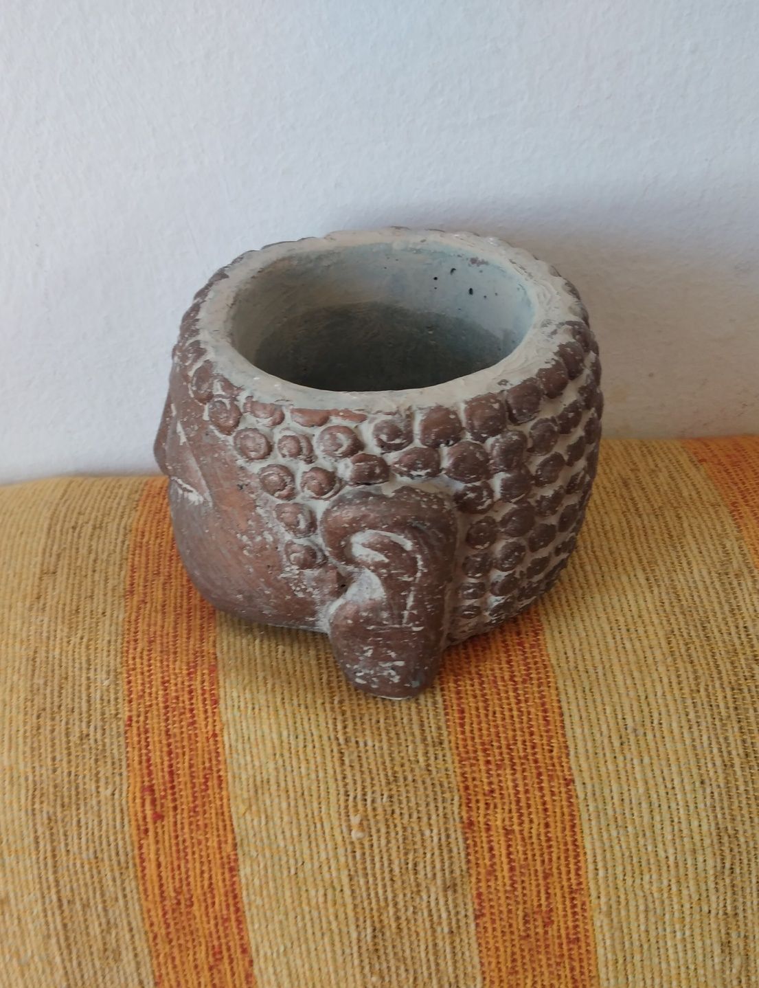 Vaso novo com cabeça de Buda marca Homa