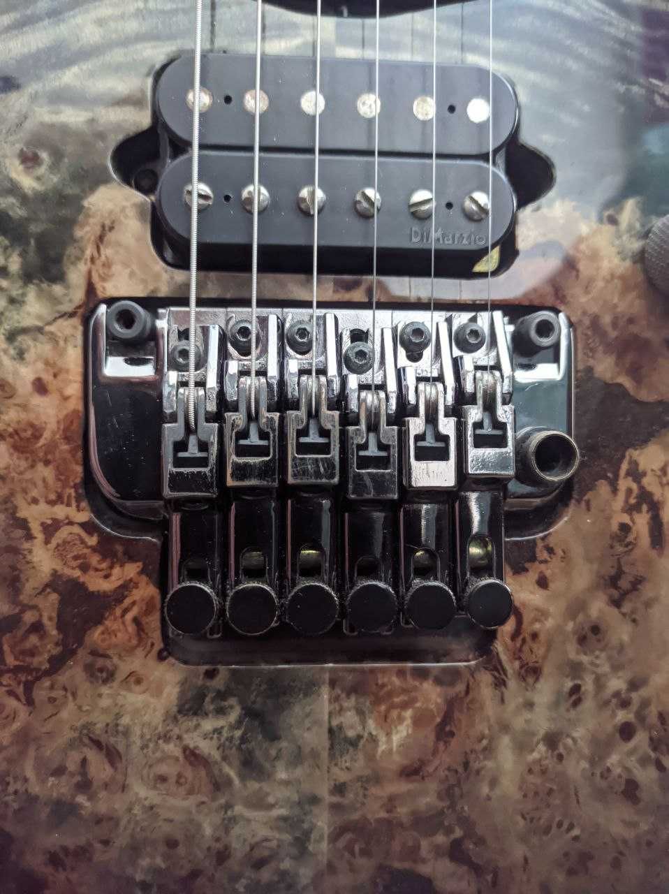 Ibanez RG 1070 PBZ CKB (Dimarzio, Stalowe progi, Poplar burl top)