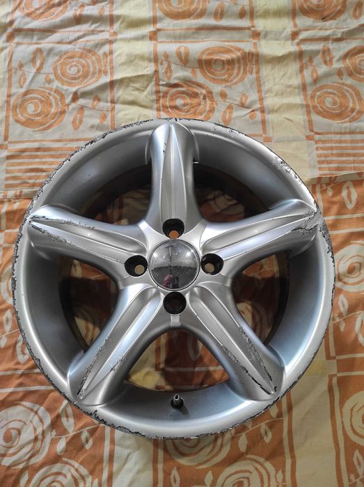 Диск литой 4*100*15