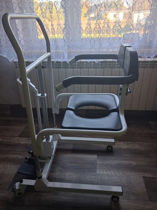 Podnośnik toaletowy elektryczny
