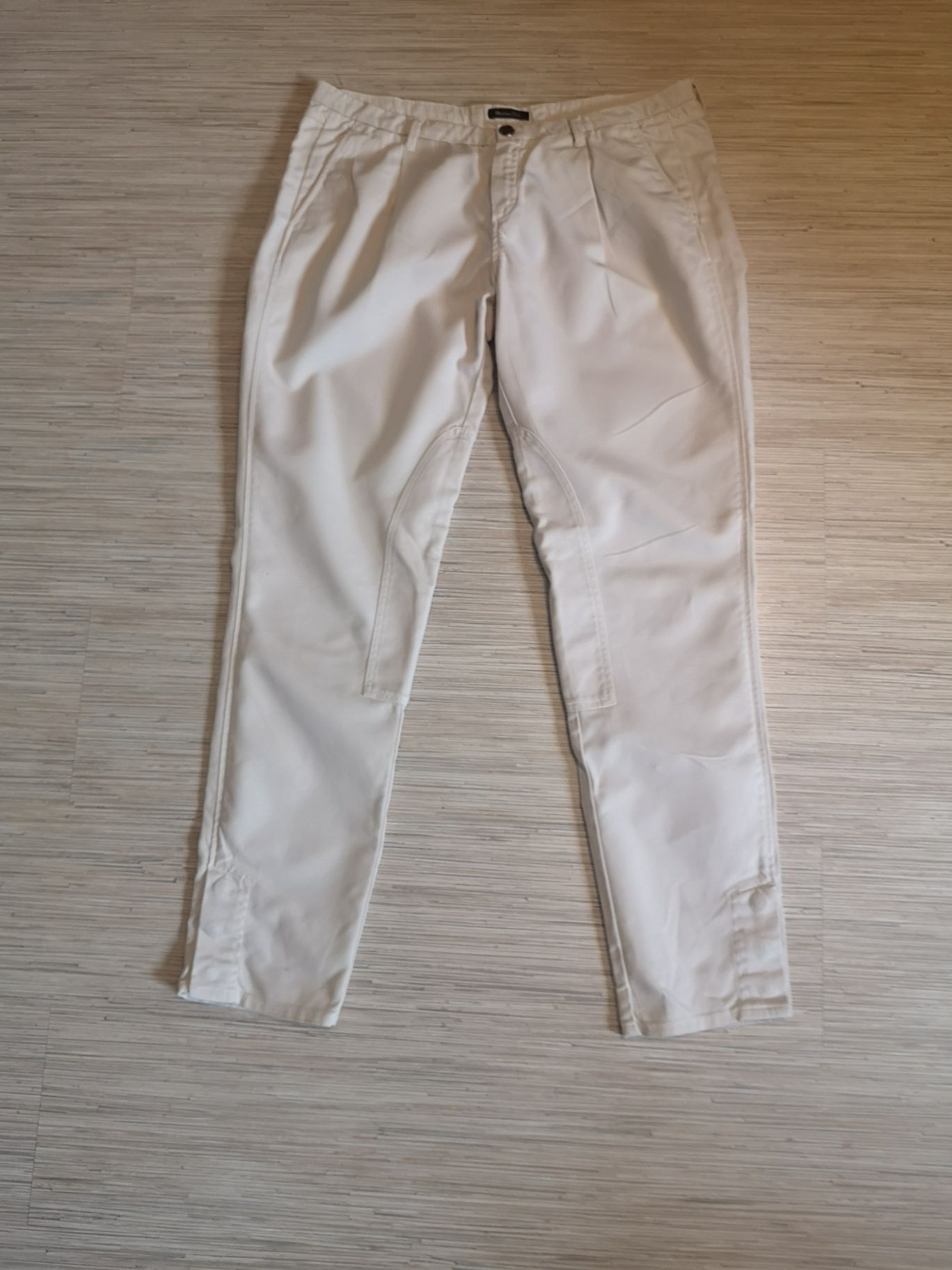 Spodnie kremowe marki Massimo Dutti rozm. 38