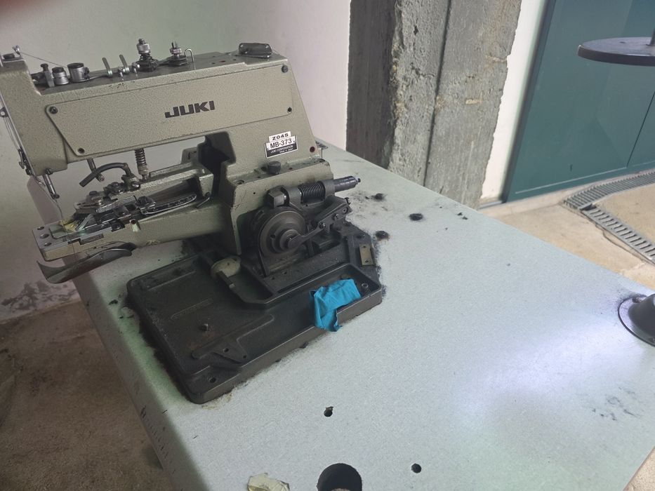 Máquina pregar botões