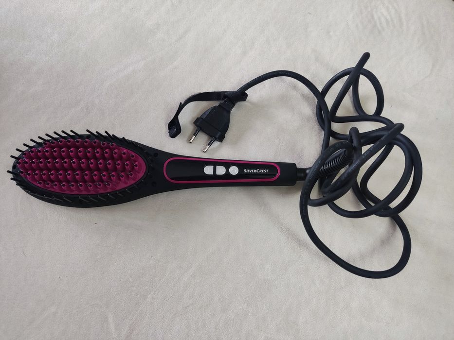 Escova de cabelo elétrica