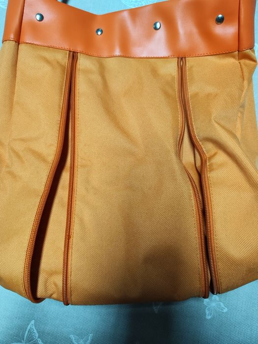 Bolsa cor de laranja de senhora