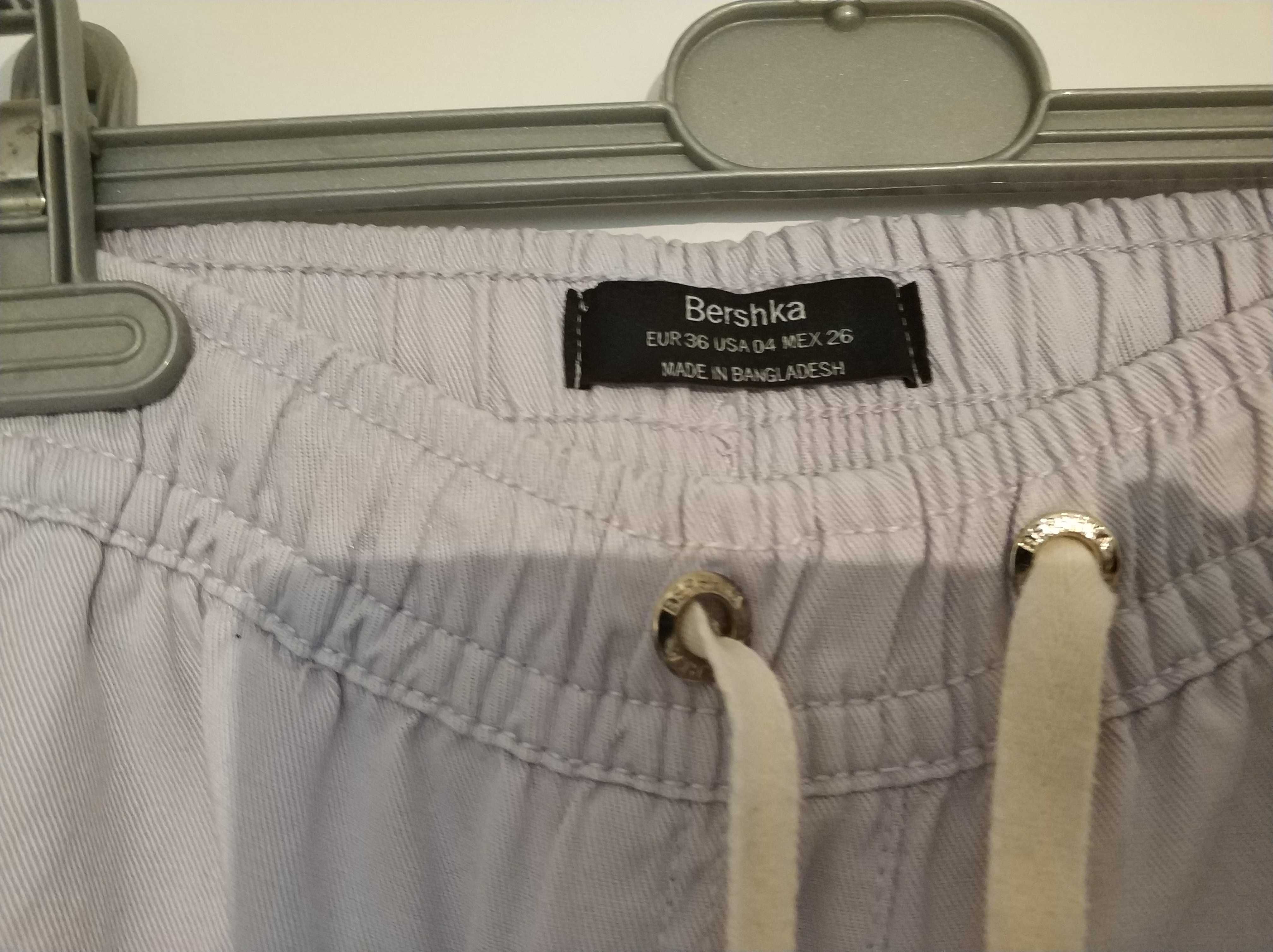 Spodnie sportowe na gumce fiołkowe, liliowe Bershka 36 S