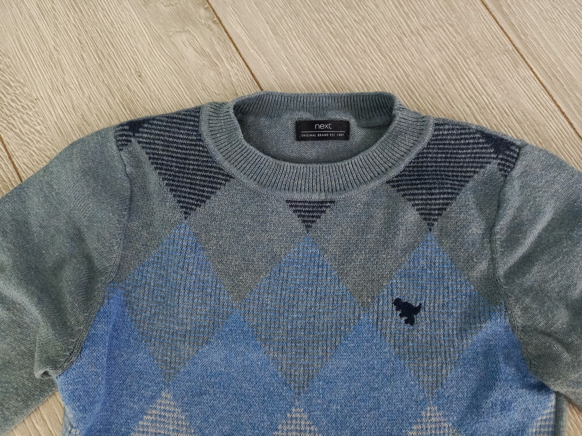 Śliczny elegancki sweter 92