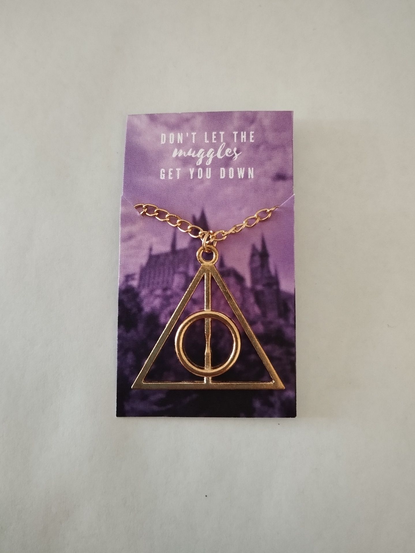 Colar Deathly Hallows Harry Potter disponível em 3 cores 
Novo e nunca