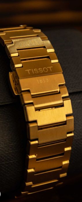 Tissot PRX dourado novo
