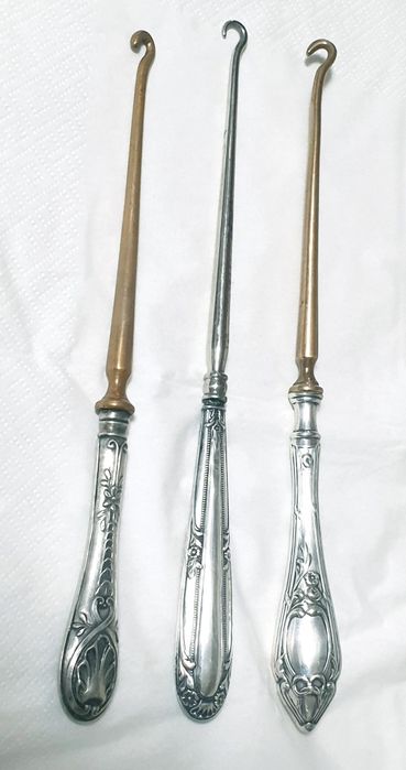 Antigas abotoadeiras com pega em prata contrastada -  Preço cada 35€