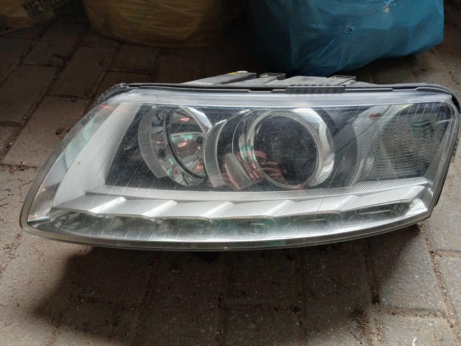 Lampa przednia lewa Audi A6 C6  2011r.