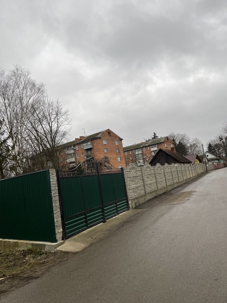 Прадам  земельну ділянку  з будинком